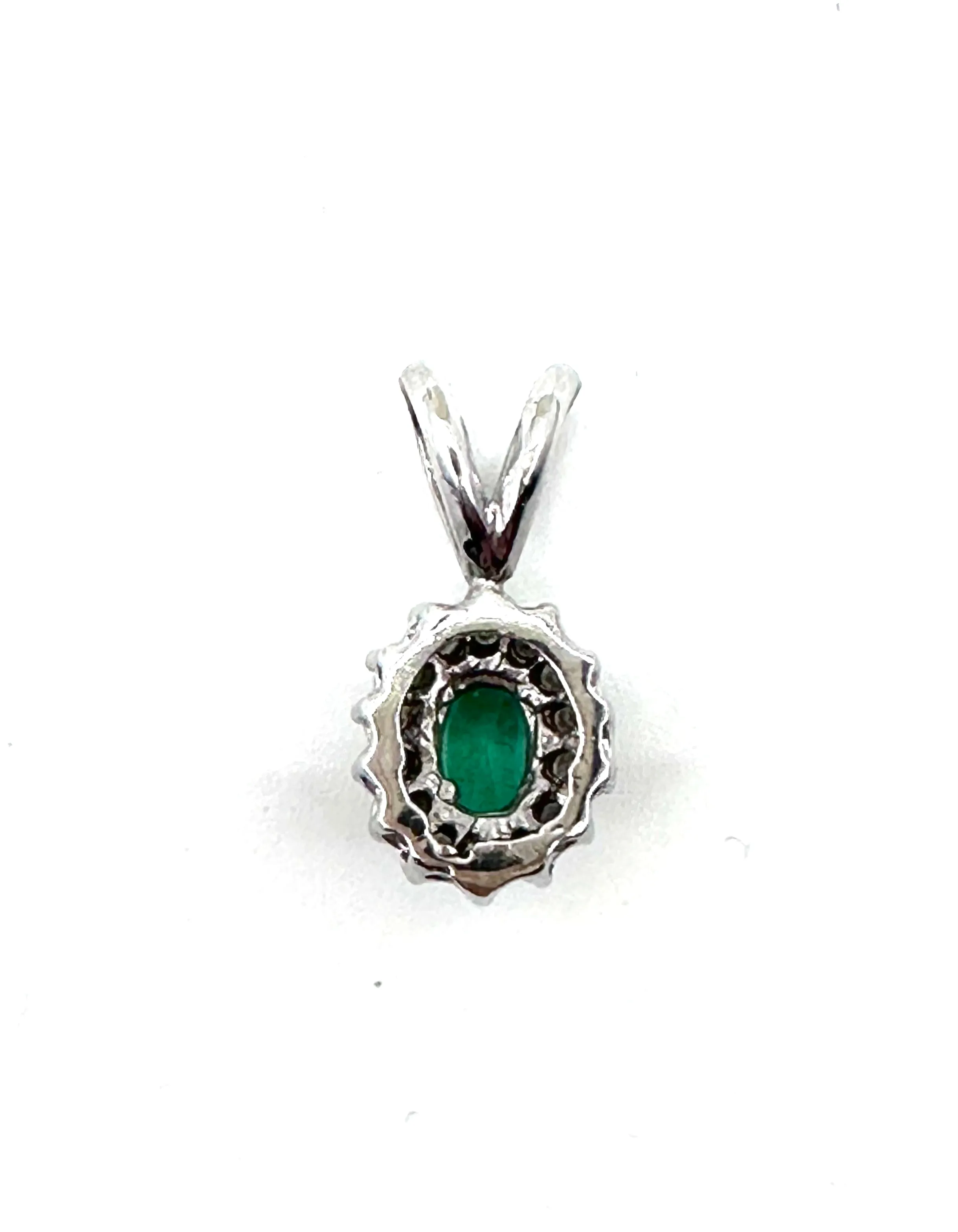 Emerald with diamond halo pendant