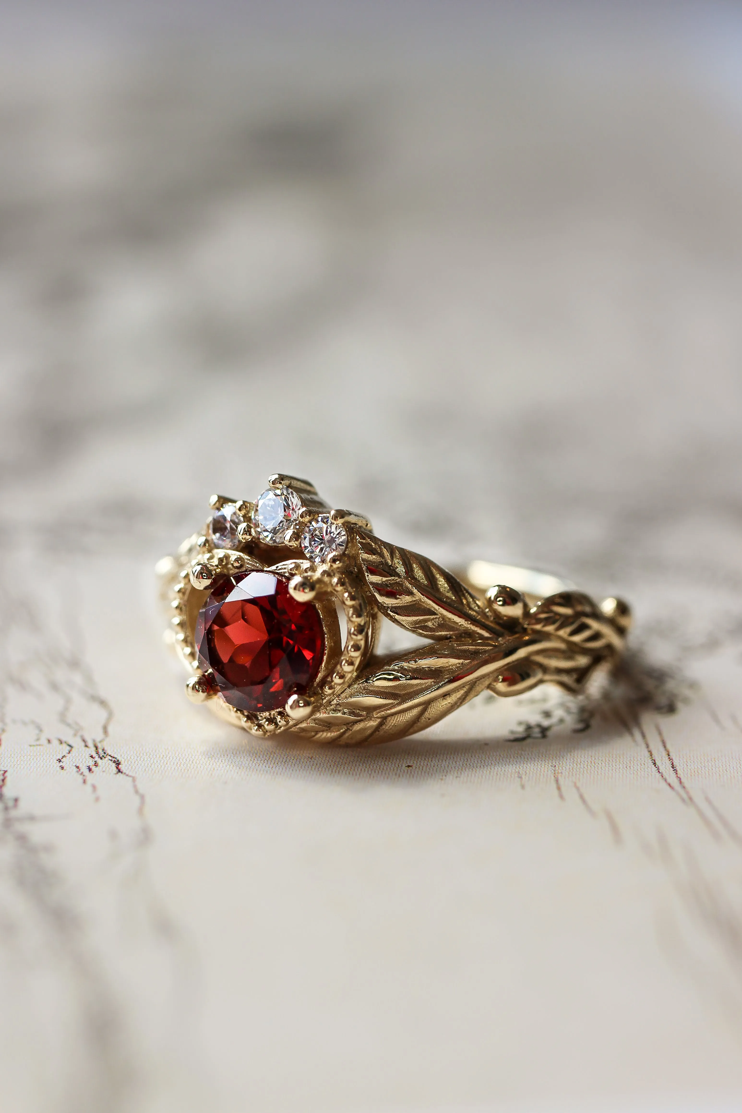 Garnet heart and diamonds engagement ring, Claddagh ring