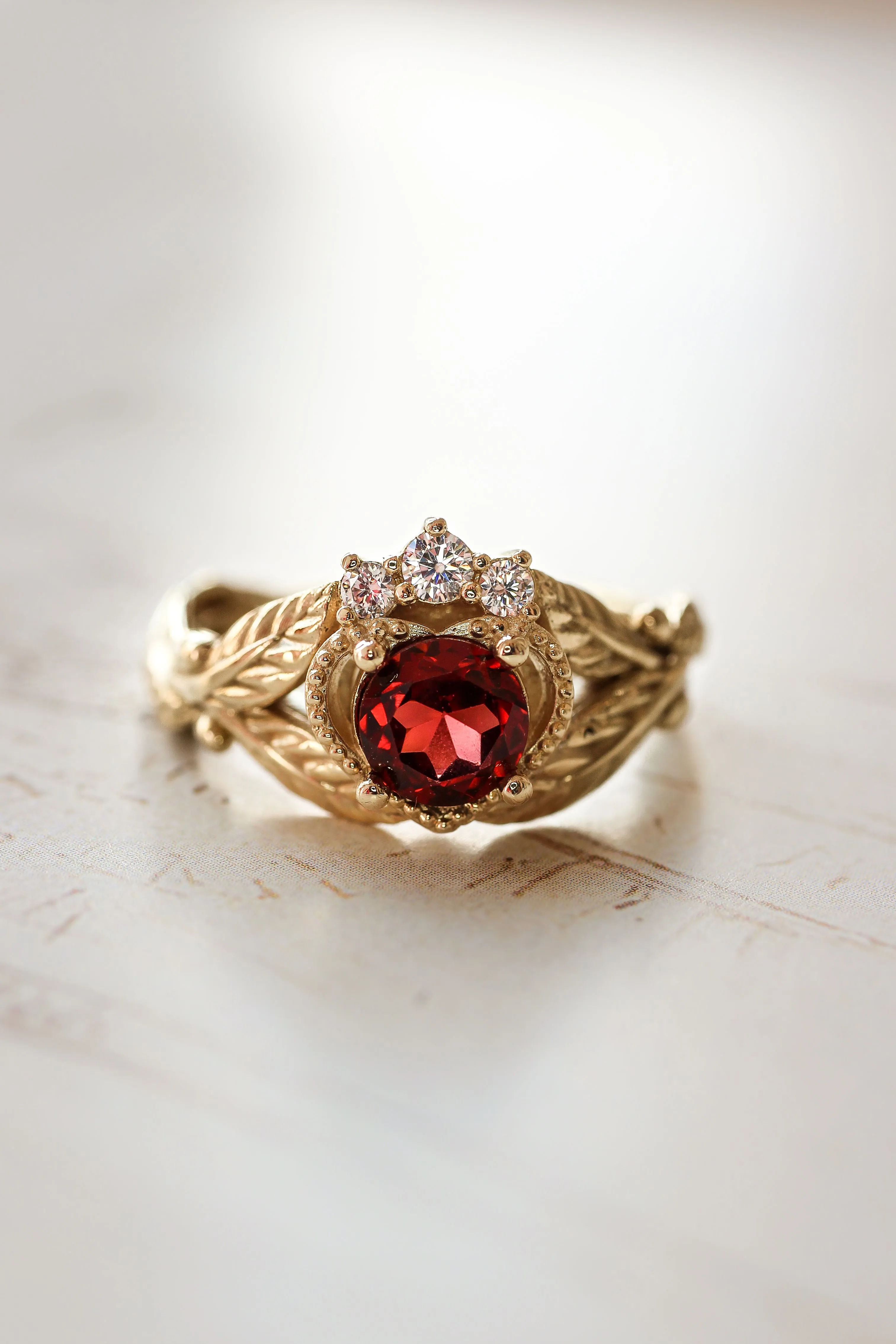 Garnet heart and diamonds engagement ring, Claddagh ring