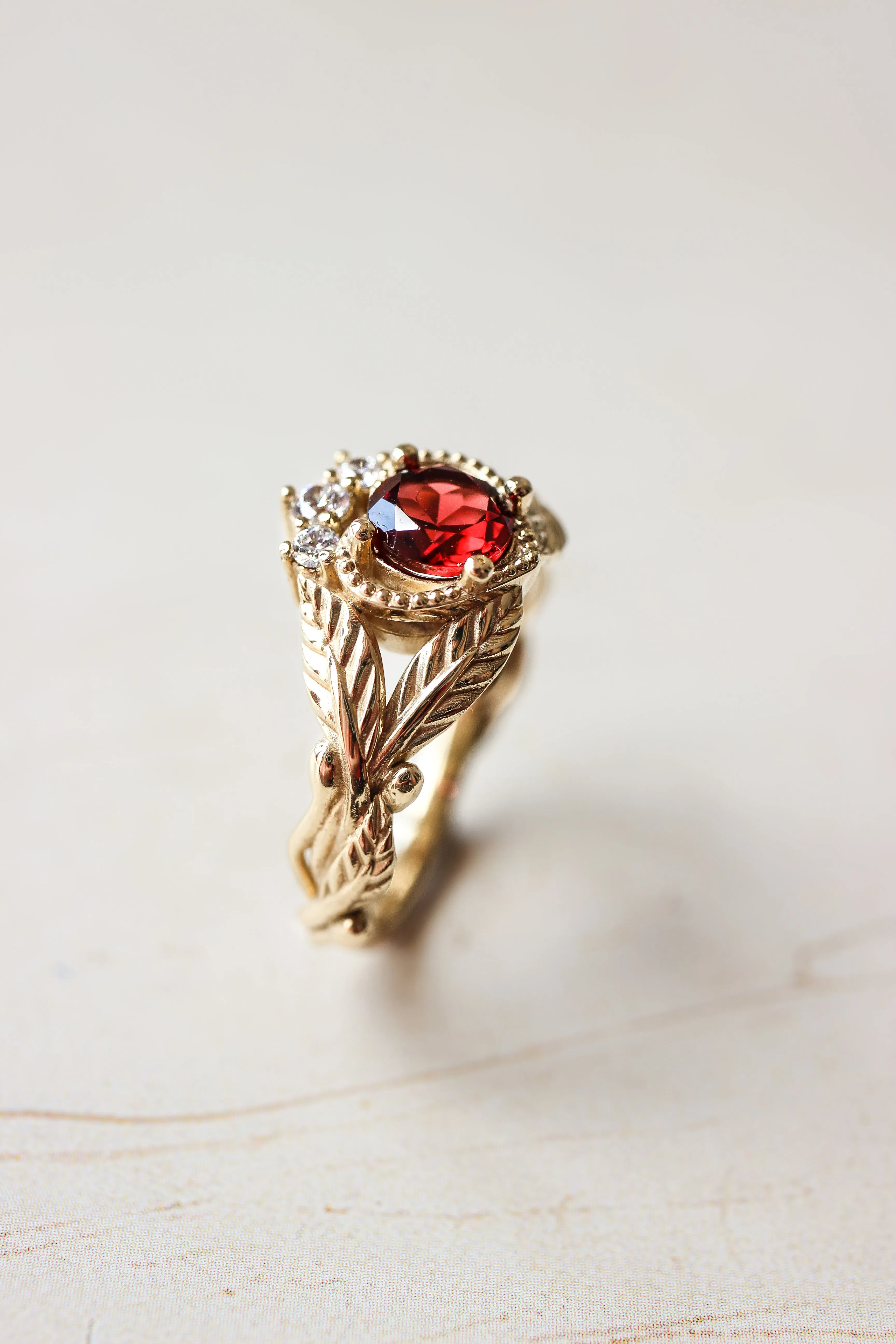 Garnet heart and diamonds engagement ring, Claddagh ring