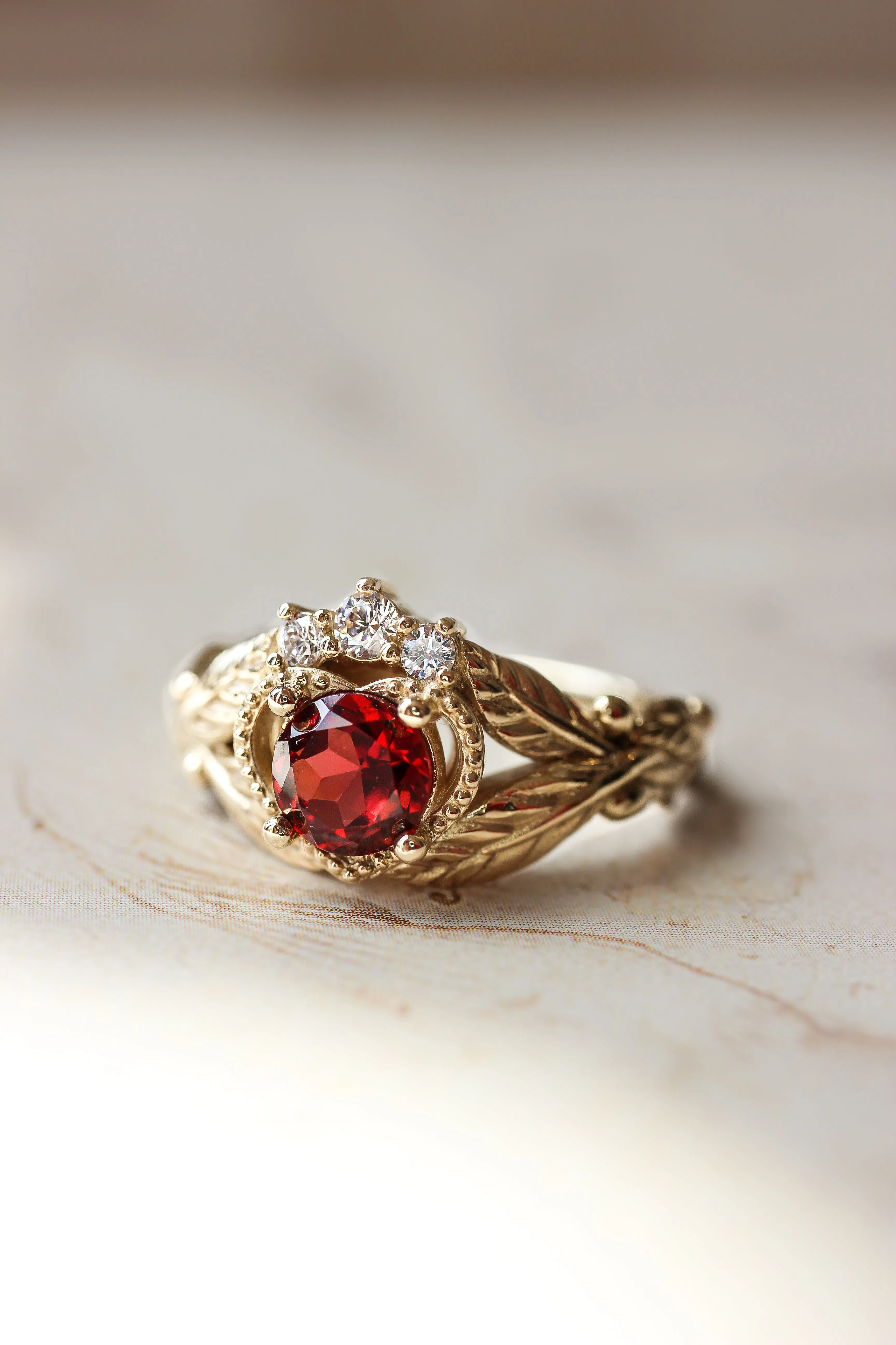 Garnet heart and diamonds engagement ring, Claddagh ring