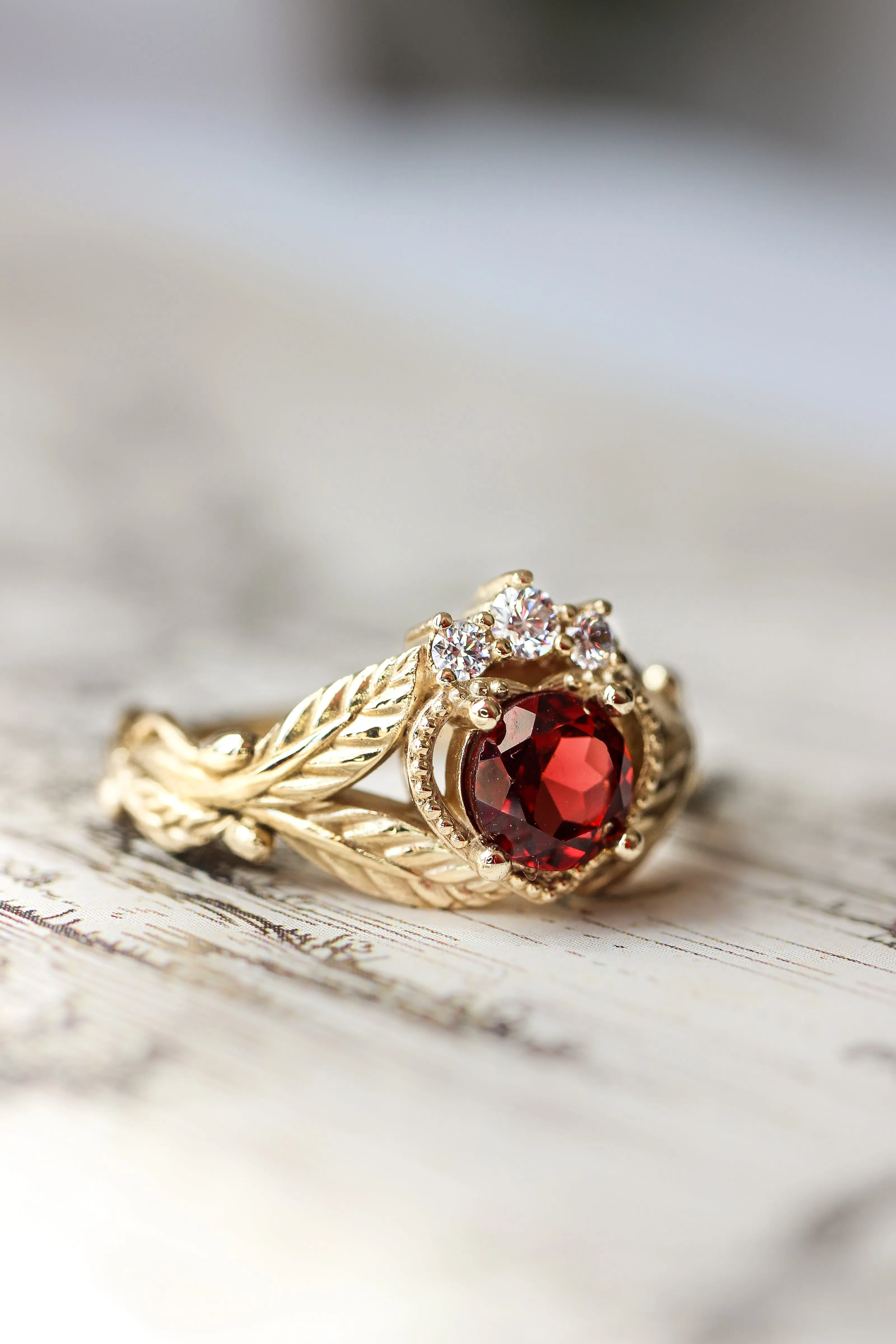 Garnet heart and diamonds engagement ring, Claddagh ring