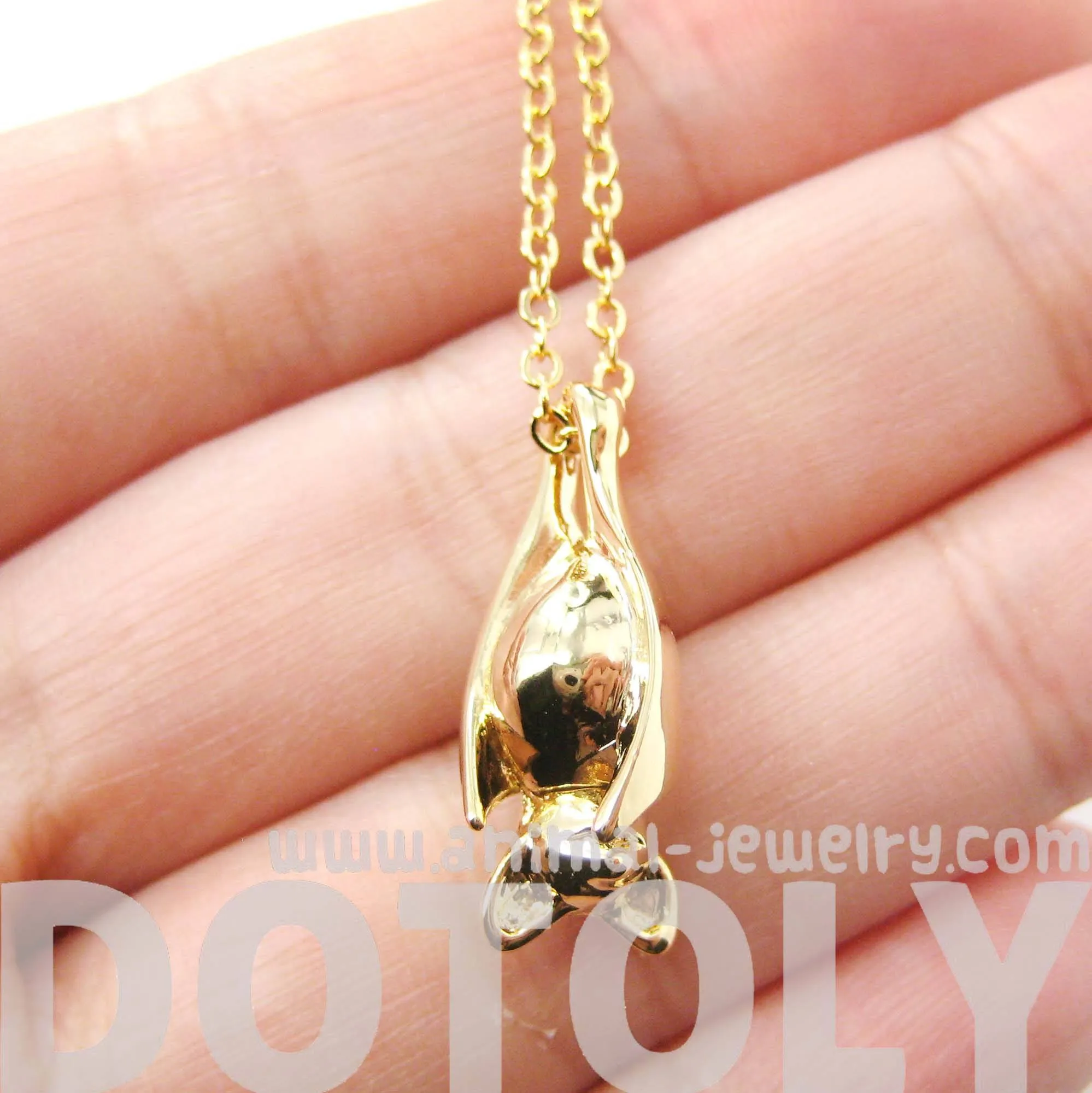 Sleek Abstract Bat Shaped Animal Pendant Necklace in Gold | DOTOLY